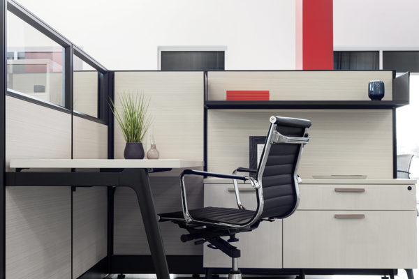 Single workstation cubicle with 67 high panels. Fabric is platinum and trim is dark tone.