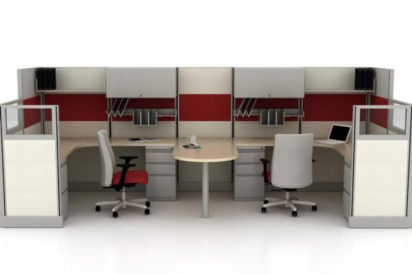 Double cubicle with shared peninsula workstation.