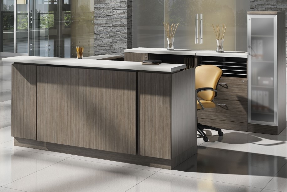 Reception desk U-group in Absolute Acajou laminate with white countertop accents and raised panel front modesty.